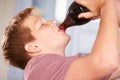 Close Up Of Boy Drinking Soda From Bottle Royalty Free Stock Photo