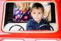 Close Up of a Boy on a Merry-Go-Round Car #3 Royalty Free Stock Photo