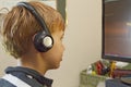 Close-up of Boy Playing Video Games on Computer Royalty Free Stock Photo