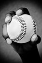 Baseball in right hand shows seams Royalty Free Stock Photo