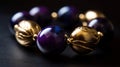 a close up of a bracelet made of gold and purple beads on a black surface with a black background and a gold clasp on the clasp Royalty Free Stock Photo