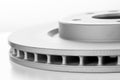 close-up brake discs on a white background, spare parts Royalty Free Stock Photo