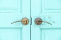 Close up Brass door handle at wood blue door Royalty Free Stock Photo