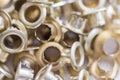 Close-up of brass eyelet. Eyelet metal color gold. Royalty Free Stock Photo