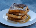 French toast stack on plate with syrup Royalty Free Stock Photo