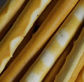 Close up of breadsticks on black background created using generative ai technology