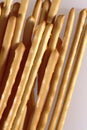 Close up of breadsticks on grey background created using generative ai technology