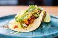 close-up of breakfast taco with chorizo and melted cheese Royalty Free Stock Photo