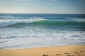 Close up on breaking wave coming to shore on sandy beach of atlantic coast, capbreton, france Royalty Free Stock Photo