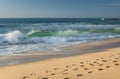 Close up on breaking wave coming to shore on sandy beach of atlantic coast, capbreton, france Royalty Free Stock Photo