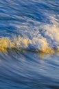 Moody close up of a breaking wave