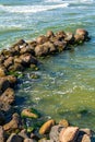 Close-up of a breakwater made of giant boulders, Baltic sea, in Palanga