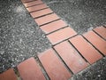 Close up bricks mixed with pebbles wash concrete. Royalty Free Stock Photo