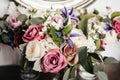 Close up of bridal wedding bouquet - pink peonies, rabbit ear plant, white hydrangea, purple lilies Royalty Free Stock Photo