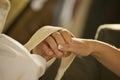 Close up of bride and groom being blessed Royalty Free Stock Photo