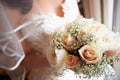 Close Up Of Bride Holding Bouquet