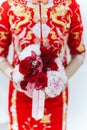 Close up of a bride holding a hand bouquet of flowers