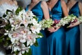 Close up of Bride's bouquet, bridesmaids behind Royalty Free Stock Photo