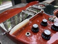 Close up bridge and tremolo of Gibson SG Maestro reissue 1961 on a store. Royalty Free Stock Photo