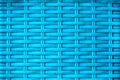 Close-Up of Bright Blue Plastic Woven Basket Texture Pattern Royalty Free Stock Photo