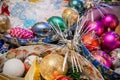 Close-up bright colorful Christmas decorations in open round boxes. Royalty Free Stock Photo