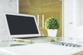 Bright desk top with empty laptop Royalty Free Stock Photo