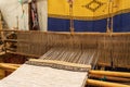 Close up of brocade fabric weaving on loom, cotton on the manual wood loom in Ouarzazate, Morocco