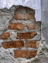 Close-up of a broken brick wall