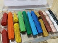 A close up of broken crayons of various colours Royalty Free Stock Photo