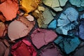 Close-up of a broken eyeshadow palette with different shades. The image is generated with the use of an AI.