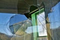 Glass window broken with a bullet hole Royalty Free Stock Photo