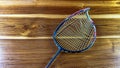 Close up broken and unusable badminton racket