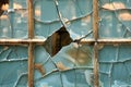 Close-up view of broken window with blue glass texture background Royalty Free Stock Photo