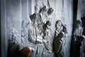 Close up of the Bronze relief sculpture of the virgin Mary by Bonanno da Pisa on the front of the Duomo cathedral in Pisa Italy Royalty Free Stock Photo