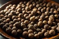 Close-up of brown allspice jamaica pepper grains in the bright sunlight. Texture of whole dried pimento berries. Concepts of Royalty Free Stock Photo