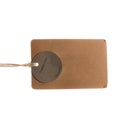 close-up of brown Blank label tied with brown rope from denim clothes on white background. mockup. Royalty Free Stock Photo