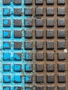 Close - up of a brown and blue manhole cover Royalty Free Stock Photo
