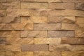 Close up of brown brick sand stone wall. Use for wallpaper or texture background Royalty Free Stock Photo