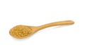 Close-up of Brown cane sugar in Wooden spoon, raw natural, Organic cane sugar isolated on white background Royalty Free Stock Photo