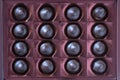 Close up brown chocolate candy background. Assortment of chocolate candies sweets in the box Royalty Free Stock Photo