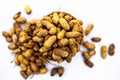 Close up of brown colored hamper having groundnuts or peanuts or moongaphalee or Arachis hypogaea or goober or monkey nut isolated Royalty Free Stock Photo