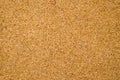 Close-up of brown cork board texture background. Empty bulletin board, natural texture Royalty Free Stock Photo
