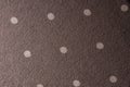 Close-Up of Brown Fabric with Light Polka Dot Pattern Royalty Free Stock Photo