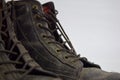 Close up of a brown old boots isolated on white background Royalty Free Stock Photo