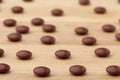 Close up brown pills on wooden table background Royalty Free Stock Photo