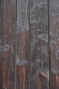 Close-up of brown planks of construction with old paint, natural wood texture, narrow boards, horizontal, wallpaper, building