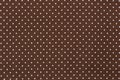 Brown polka dot background.