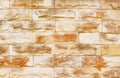 Brown sand stone old wall texture or light orange background Royalty Free Stock Photo