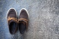 Close-up of Brown shoes on Rough ground background Royalty Free Stock Photo