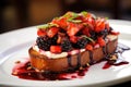 a close-up of a bruschetta with berry compote